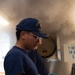 Coast Guard Cadet assists culinary specialists aboard USCGC Eagle