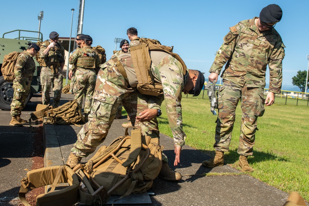 Yokota Commemorates National Police Week with a Memorial 5k Ruck March