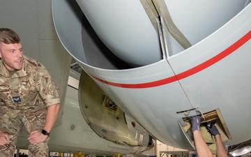RAF maintainers inspect jet