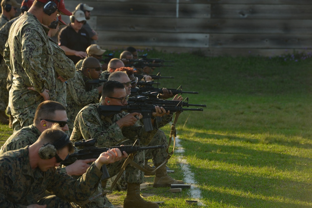 Seabees assigned to Naval Mobile Construction Battalion (NMCB) conduct weapons qualification for the M-4 rifle