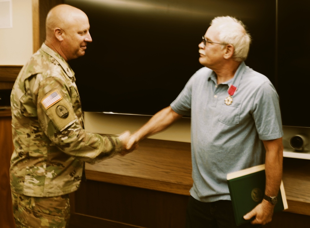 Chief Warrant Officer 5 Mark Adams Awarded the Legion of Merit for More Than 40 years of Service