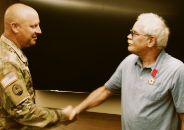 Chief Warrant Officer 5 Mark Adams Awarded the Legion of Merit for More Than 40 years of Service