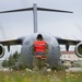 Airman marshals C-17 Globemaster III before takeoff