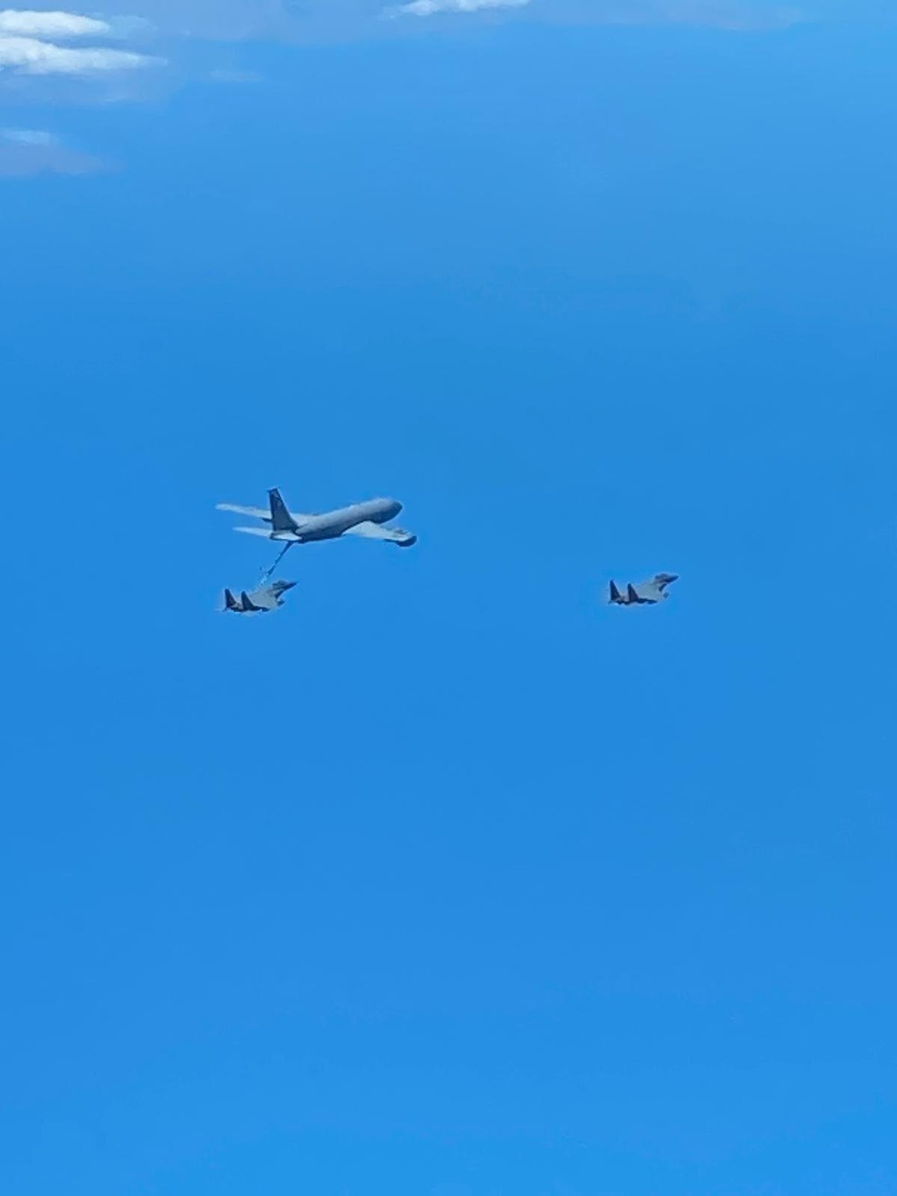 U.S. Air Force F-15Es refuel during exercise Formidable Shield