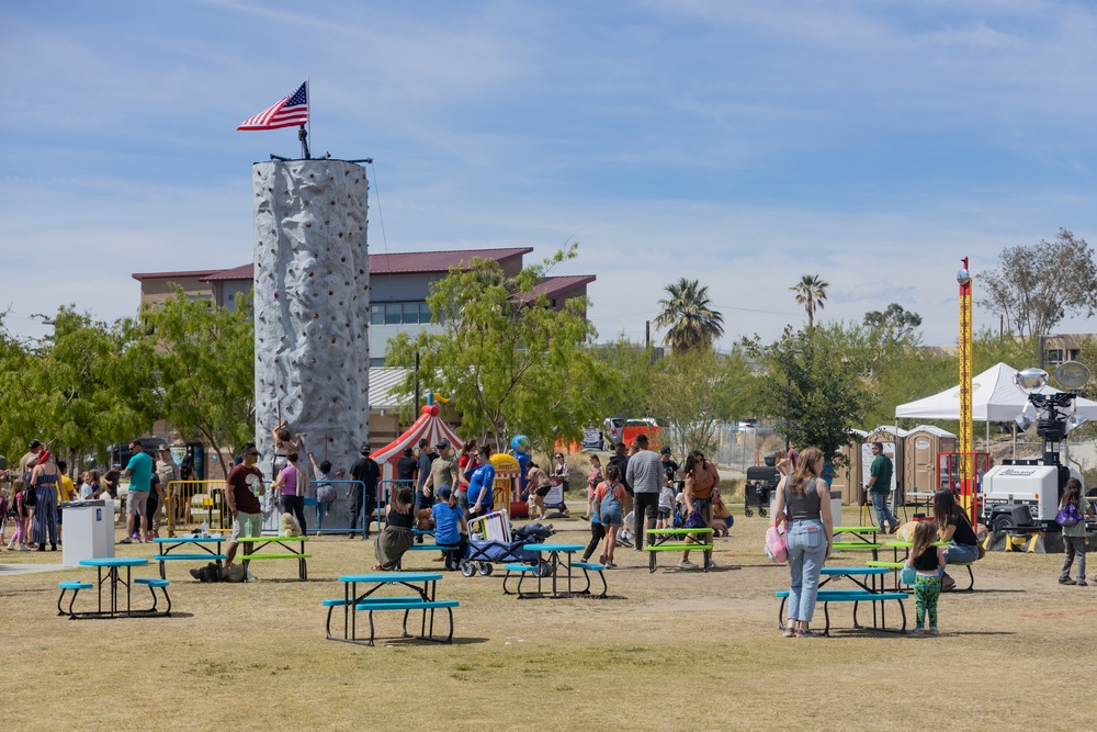 Service members and their families celebrate during the We Salute You Celebration