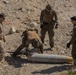 EOD Technicians plant controlled explosives as part of a training and documentation exercise for future EOD classes