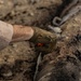 EOD Technicians plant controlled explosives as part of a training and documentation exercise for future EOD classes