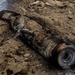 EOD Technicians plant controlled explosives as part of a training and documentation exercise for future EOD classes