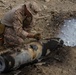 EOD Technicians plant controlled explosives as part of a training and documentation exercise for future EOD classes