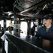 USS Ramage Sailor Mans the Helm