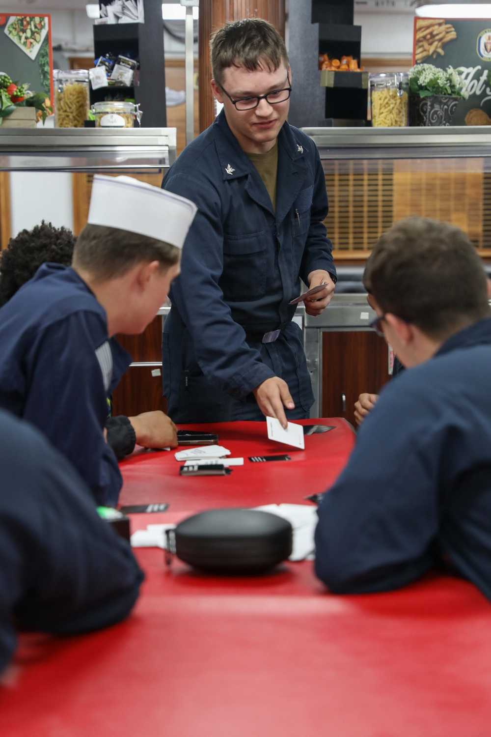 USS Ramage Sailors During MWR Game Night