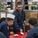 USS Ramage Sailors During MWR Game Night