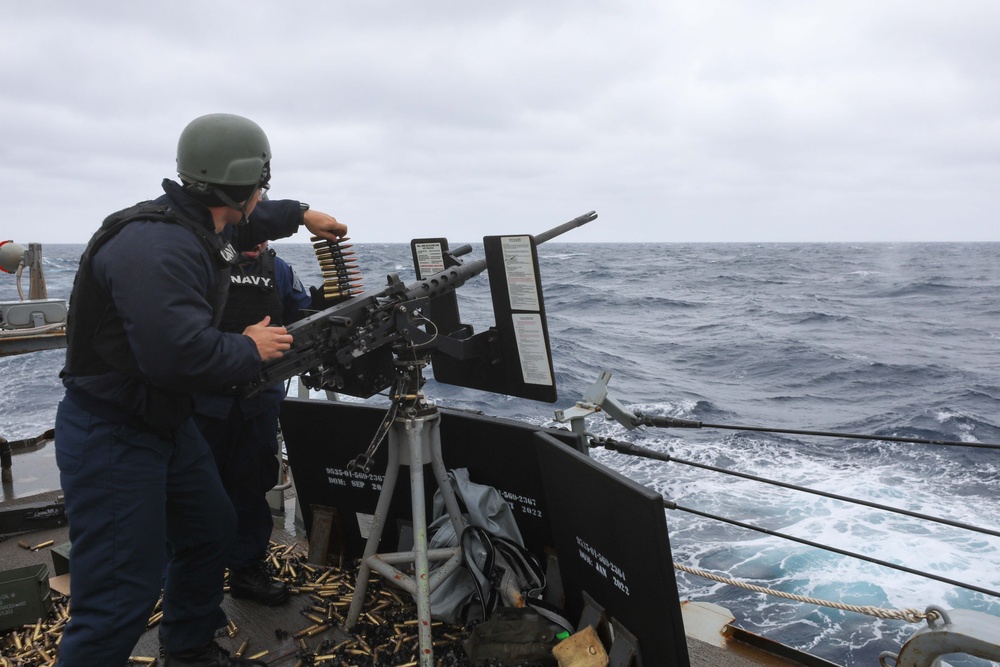 USS Ramage Sailor Reload Machine Gun