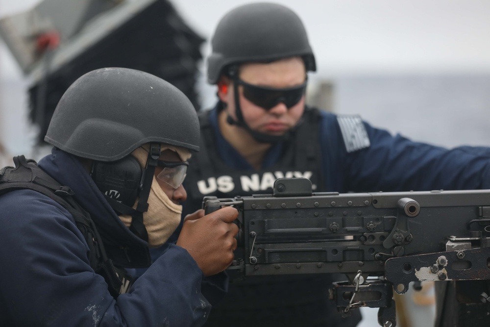 USS Ramage Sailor During Gun Shoot