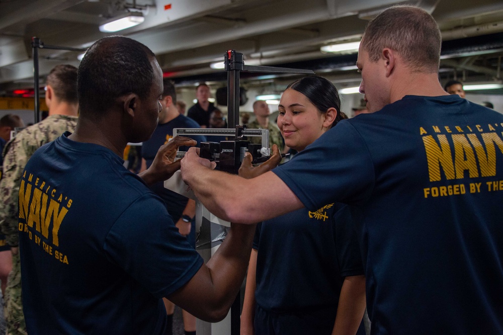 USS Carl Vinson (CVN 70) Sailors Conduct a Body Composition Assessment