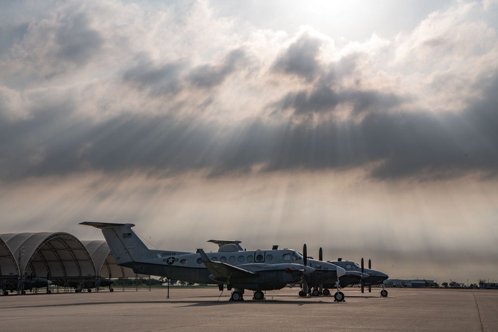 Will Rogers Air National Guard Base: MC-12W under sunbeams