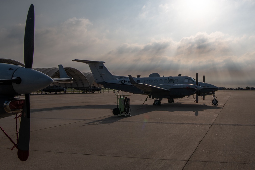 Will Rogers Air National Guard Base: MC-12W under sunbeams