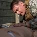 U.S. Navy Sailors conduct a Tactical Casualty Care Tier Three Instructor test