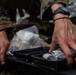 U.S. Navy Sailors conduct a Tactical Casualty Care Tier Three Instructor test