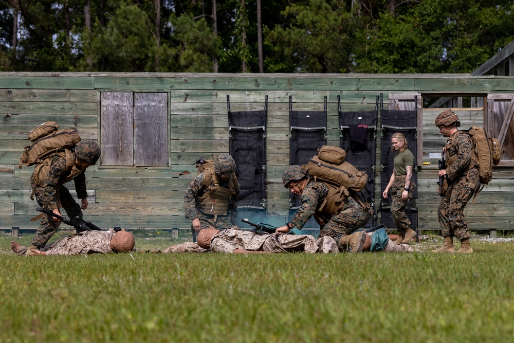 U.S. Navy Sailors conduct a Tactical Casualty Care Tier Three Instructor test