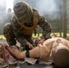U.S. Navy Sailors conduct a Tactical Casualty Care Tier Three Instructor test