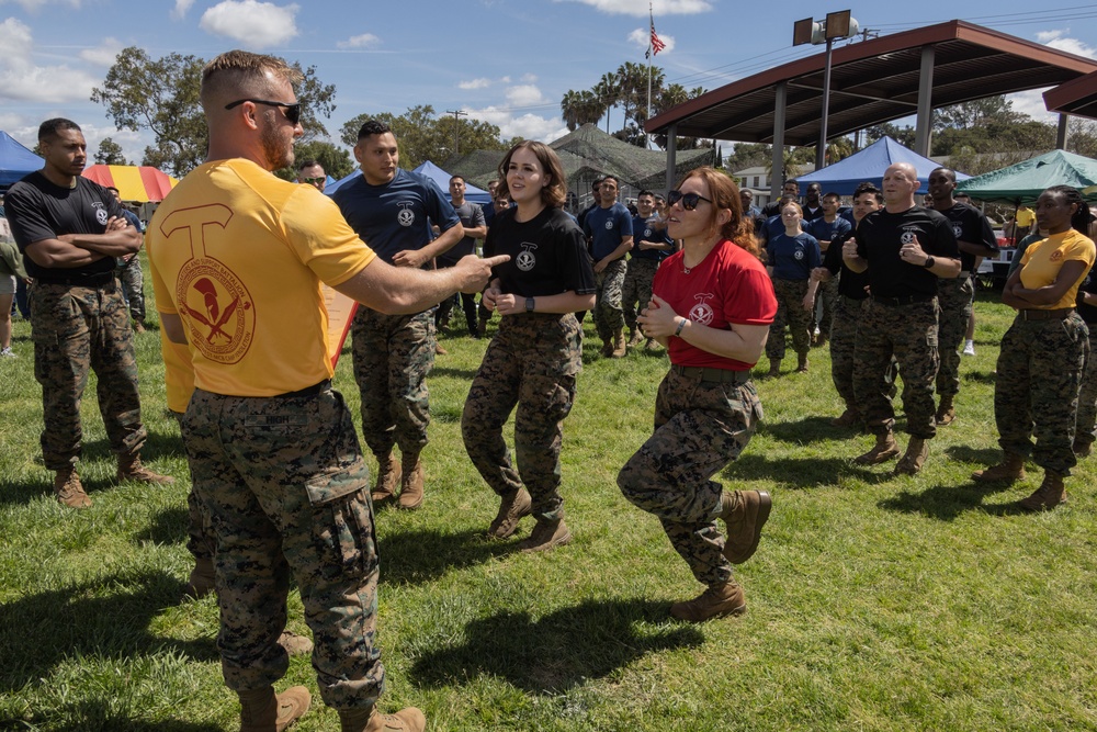 Marines with H&amp;S Bn. celebrate with friends and family at Spartan De Mayo