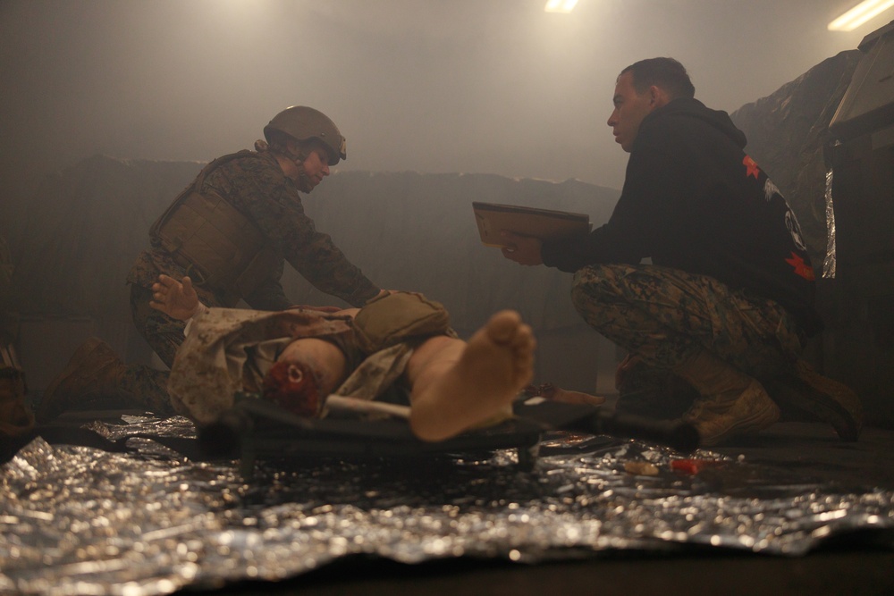 U.S. Navy Sailors Conduct a Tactical Casualty Care Tier Three Instructor Test