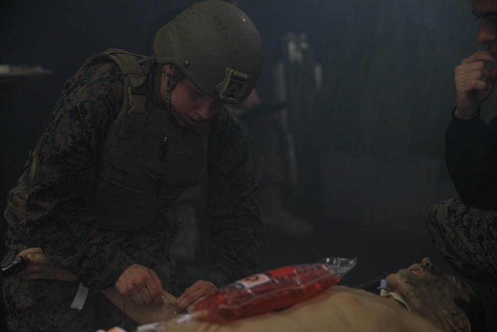 U.S. Navy Sailors Conduct a Tactical Casualty Care Tier Three Instructor Test