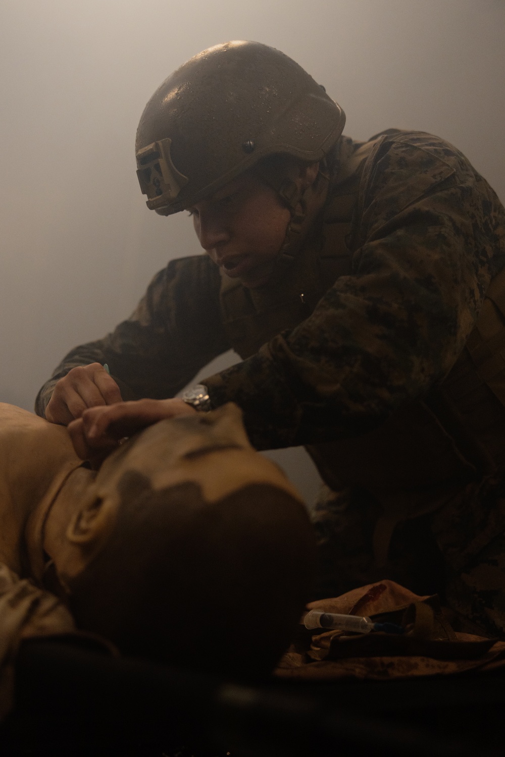U.S. Navy Sailors Conduct a Tactical Casualty Care Tier Three Instructor Test