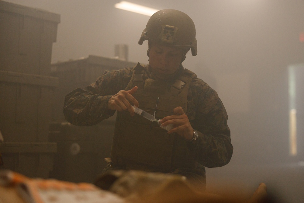 U.S. Navy Sailors Conduct a Tactical Casualty Care Tier Three Instructor Test