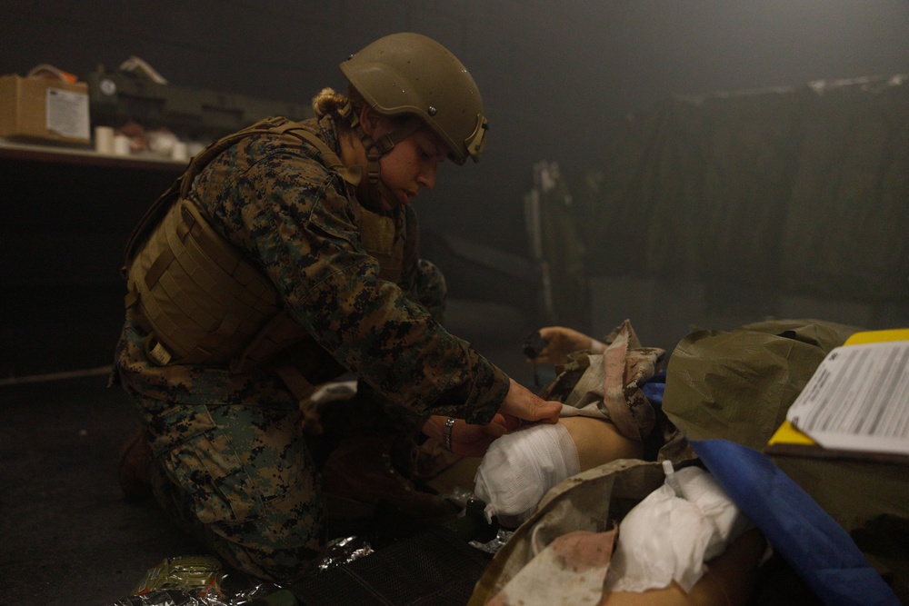 U.S. Navy Sailors Conduct a Tactical Casualty Care Tier Three Instructor Test