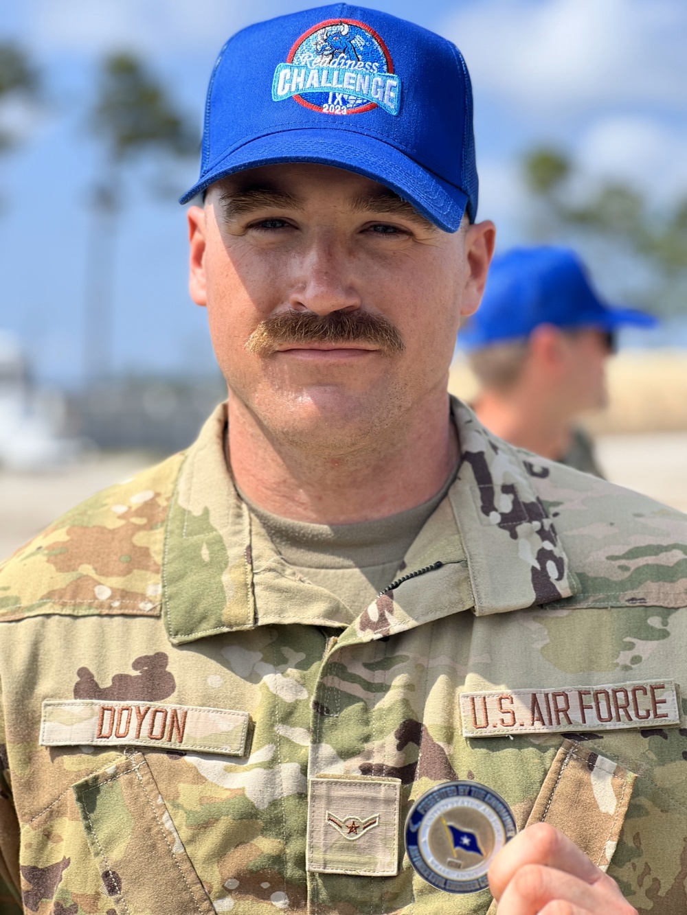 Doyon Receives Challenge Coin during Readiness Challenge