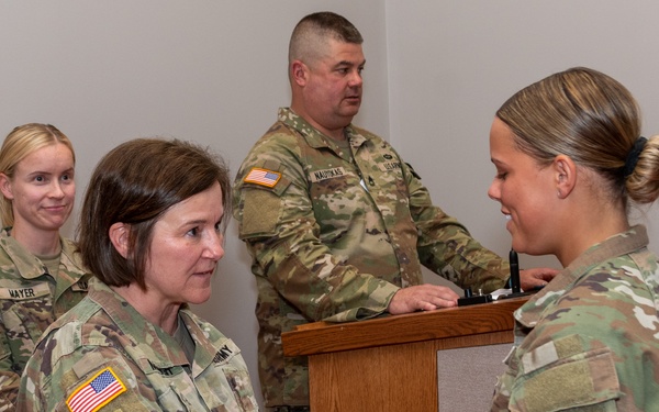 EOL course graduates receive EO brassards