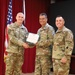 Col. Bill Soliz receives Legion of Merit from Brig. Gen. Edward Bailey