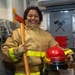 Damage Controlman Fireman Faustita Asano, from Kalihi, Hawaii poses for a photo