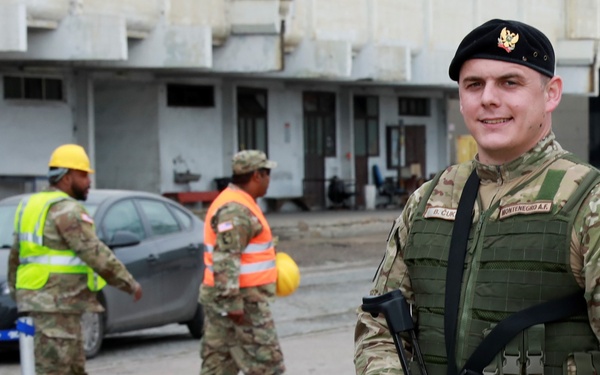 Soldiers from the 793rd MCT, 7th MSC join Sailors and National Guard Soldiers to make U.S. cargo transport history in Montenegro