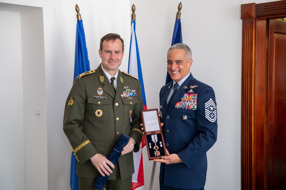 SEAC accepts Honorary Badge of Merit