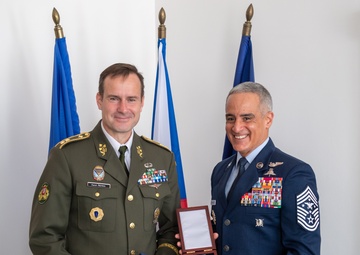 SEAC accepts Honorary Badge of Merit