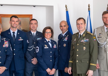 SEAC accepts Honorary Badge of Merit