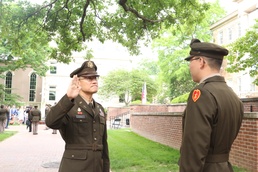 Chaplain administers oath to son during ROTC commissioning ceremony on UNC