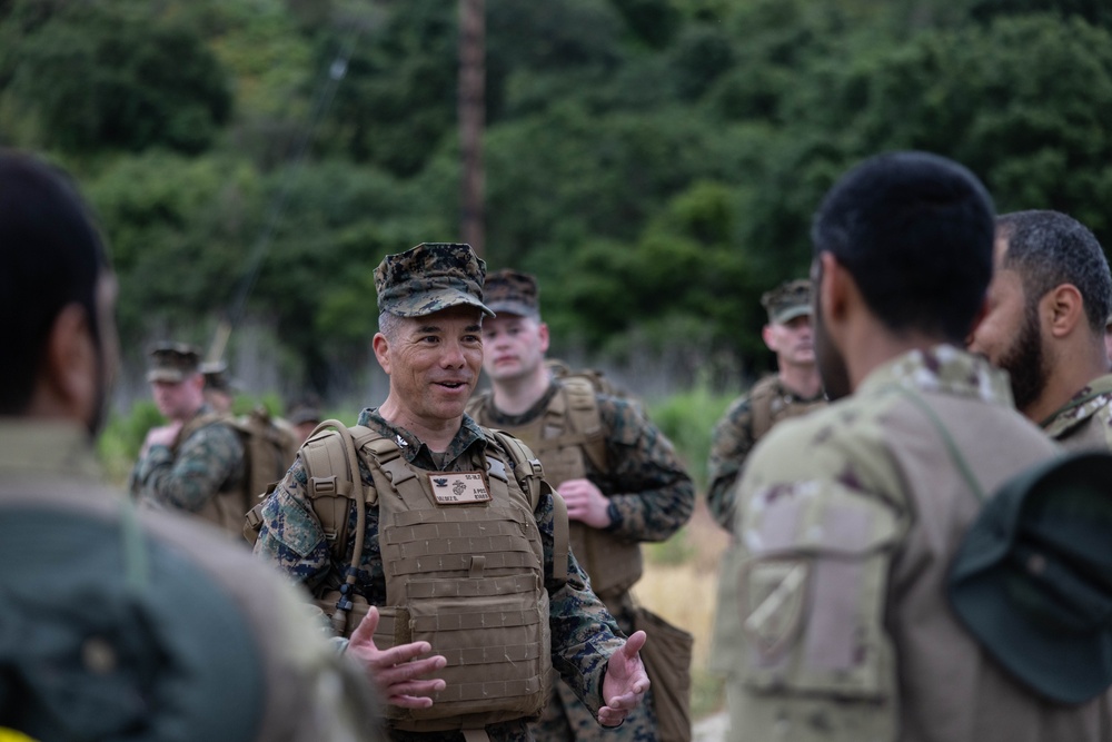 U.S. Marines hike with members of UAE Presidential Guard