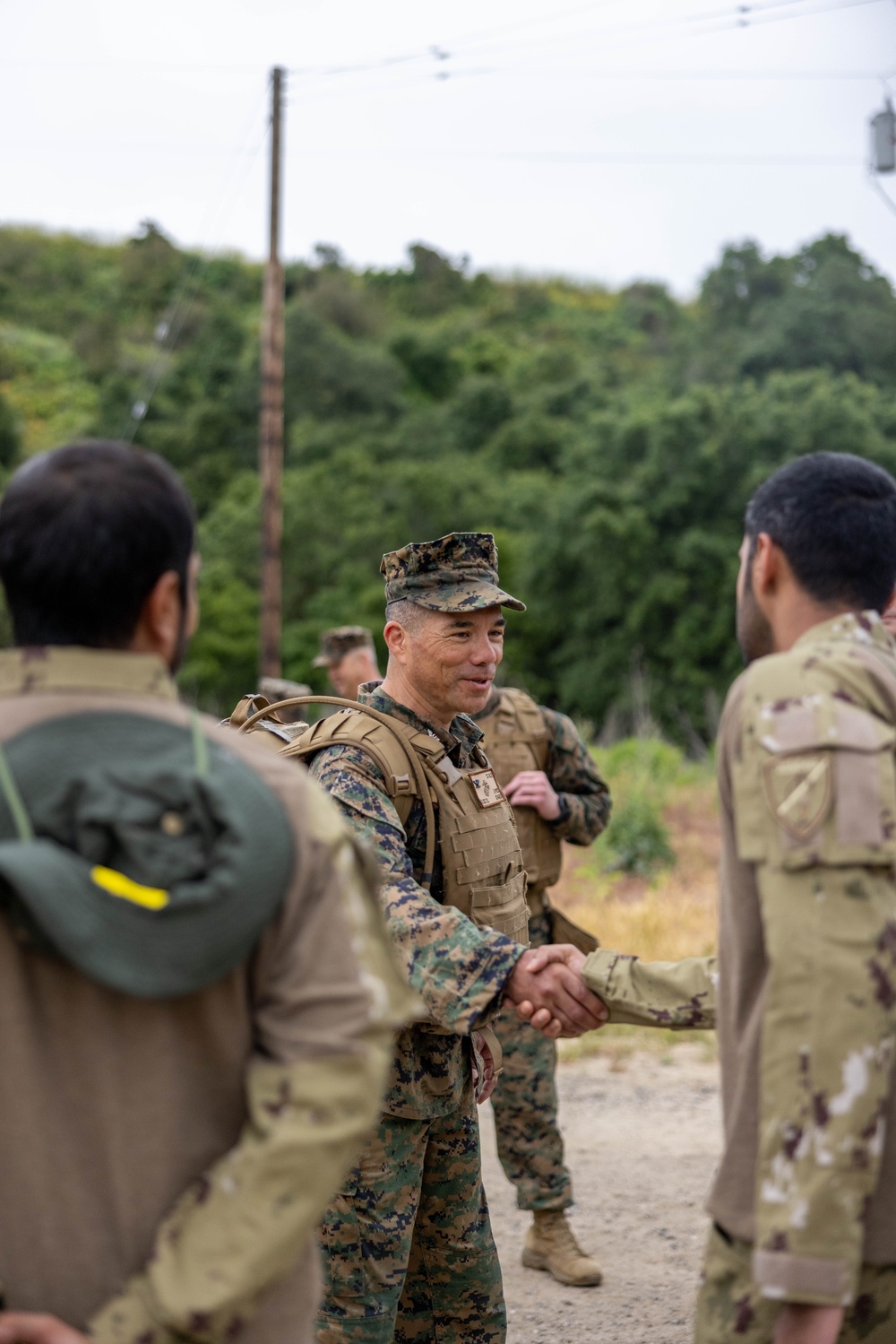 U.S. Marines hike with members of UAE Presidential Guard