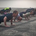 USS Ronald Reagan (CVN 76) Sailor commence flight deck PT