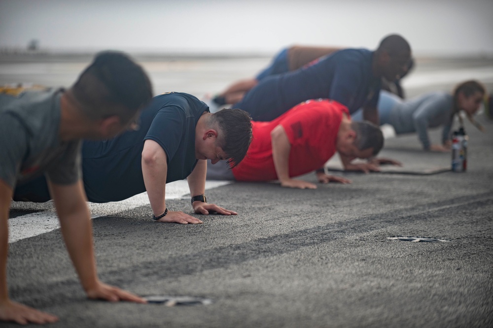 USS Ronald Reagan (CVN 76) Sailor commence flight deck PT