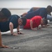 USS Ronald Reagan (CVN 76) Sailor commence flight deck PT