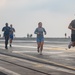 USS Ronald Reagan (CVN 76) Sailor commence flight deck PT