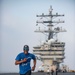 USS Ronald Reagan (CVN 76) Sailor commence flight deck PT