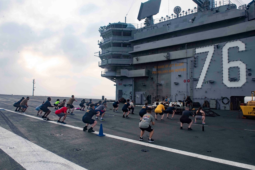 USS Ronald Reagan (CVN 76) Sailor commence flight deck PT