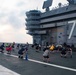 USS Ronald Reagan (CVN 76) Sailor commence flight deck PT