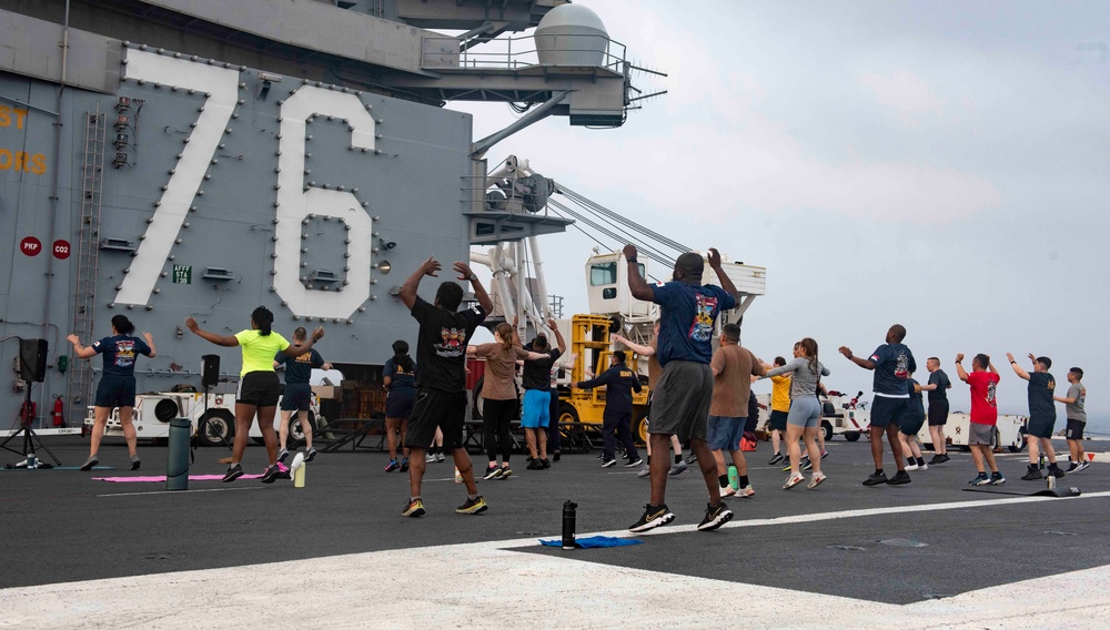 USS Ronald Reagan (CVN 76) Sailor commence flight deck PT